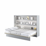 Unfolded double horizontal wall bed in white matt with internal shelves, showing a comfortable bed area ready for use.