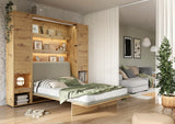 Open double vertical wall bed in Oak Artisan wood finish, flanked by matching side cabinets with drawers. Features built-in interior shelves and a comfortable mattress space for smart UK bedrooms.