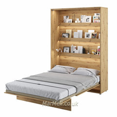 Open Oak Artisan vertical wall bed with internal shelves. Features gas struts for easy pneumatic opening.
