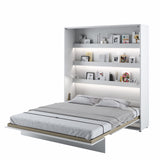 Open super king size vertical wall bed in white matt, showing the unfolded double bed frame and practical interior storage shelves